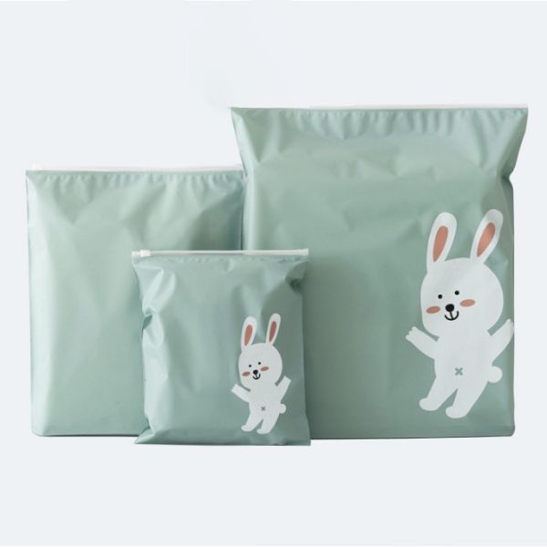 Sac imperméable cosmétique à la maison de tirette de sachets en plastique de coutume de voyage de bande dessinée