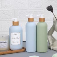 Garrafa de shampoo com tampa de bambu HDPE Tipo plástico Toque suave recipiente de loção corporal vazia