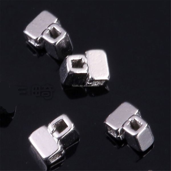 Dental ortodoncia gancho en forma de cuchillo de tubo cruzado/doble tubo ganchos de deslizamiento dividido para alambres de arco Vida útil 2 años por grado