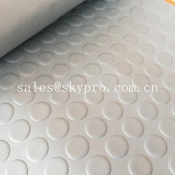 Industrial rubber flooring mat with assorted colors and textures