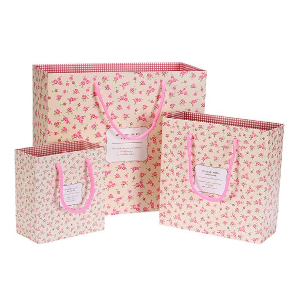 Cheap paper bag packaging wedding gift packaging with rope handle