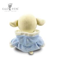Brinquedo de ursinho de pelúcia com arco