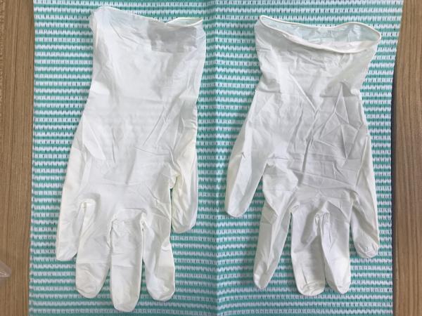 Disposable Powder Free Vinyl Gloves Stretch Creamy Color Vinyl Gloves