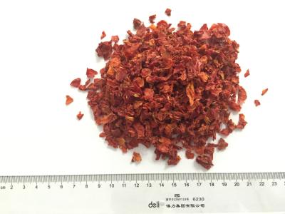 Os tomates secados da colheita ar novo lascam-se tamanho de 9x9mm com umidade de 7%