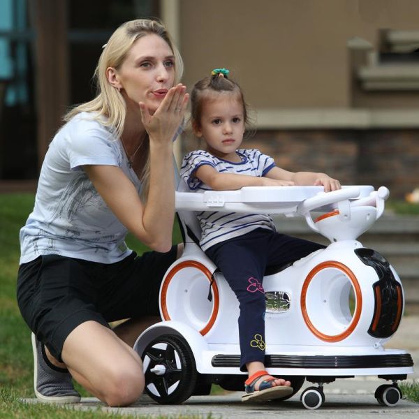 Carro eléctrico para niños con manija retráctil y luces coloridas