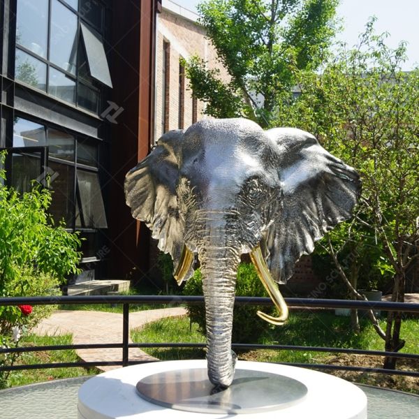 Esculptura de cabeza de elefante de acero inoxidable a medida con acabado de pulido de espejo