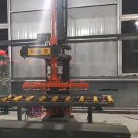 Système électrique de chargement et de déchargement automatique d'une dalle de pierre