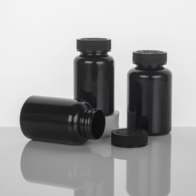 Highly Customized 4oz PET Capsule Bottle of Orange Black Plastic Nutrition Supplement with Purple Tamper Proof Packaging