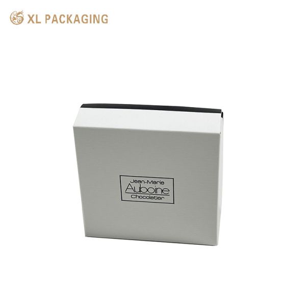Luxury White Embossed Chocolate Box with PET Tray - Flat Shippable Two-Piece Foldable Candy Gift Box with Black Foil Stamping