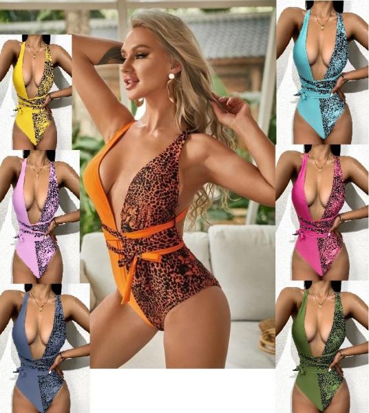 Das mulheres apertadas instantâneas da praia do triângulo do roupa de banho de uma peça só das senhoras do decote em V as senhoras uma do roupa de banho remendam o sunprotection do roupa de banho