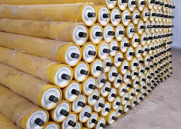 Low Noise Sealed Disc Belt Conveyor Roller Alloy Material Patterned Rubber Lining