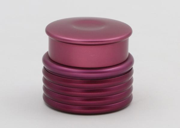 Os frascos cosméticos de vidro roxos, os recipientes de creme de vidro para desnatam e loções