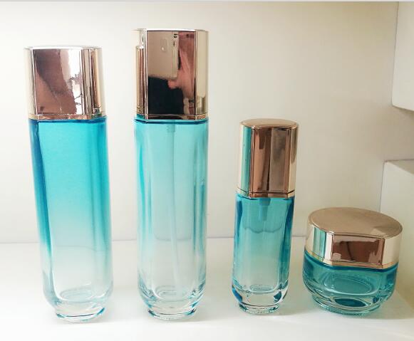 Tarros cosméticos de cristal modificados para requisitos particulares Skincare de la botella y de la crema que empaqueta la diversas pintura y serigrafía