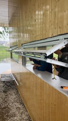 Garden Meditation Space Folding Window Connecting to Rock Gardens with Sound Buffering Acoustic Properties