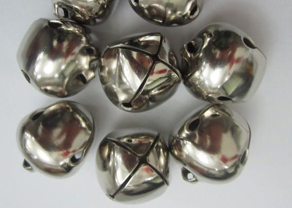 Holiday decorations silver cross jingle bell Holiday decorations silver cross jingle bells