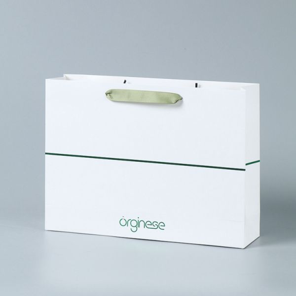 Customized Logo Accepted Ivory Board Paper Bags for Boutique Requirement