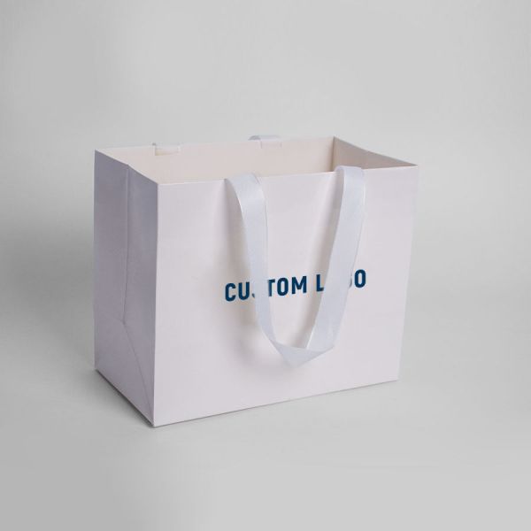 CMYK Bolsa de regalo de compras Partone para diseño personalizado 250 Gsm Art Papel de ropa embalaje