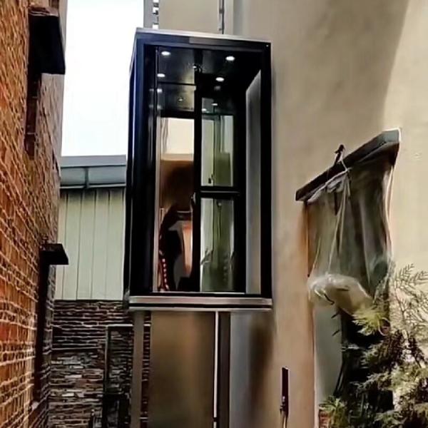 Elevador hidráulico para casa de cabine nua   5 paragens com largura mínima de abertura da porta de 500 mm