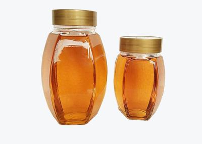 Característica de vidro sextavada oval de Honey Jars Transparent Color Moistureproof