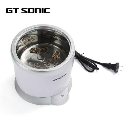 Um líquido de limpeza ultrassônico do agregado familiar do botão com forma redonda do tanque destacável
