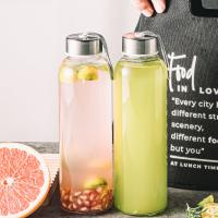 Bouteilles d'eau en verre transparent de 500 ml 750 ml 1000 ml en gros avec couvercle et couvercle