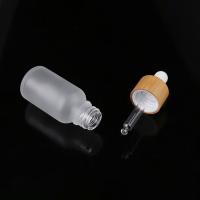 Venda quente garrafa de vidro de creme geada da loção dos cosméticos do óleo do cbd do óleo essencial do olho ambarino com o tampão de bambu do conta-gotas