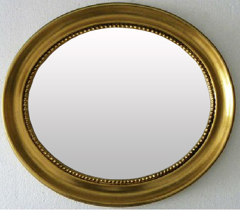 golden oval framed bathroom mirror