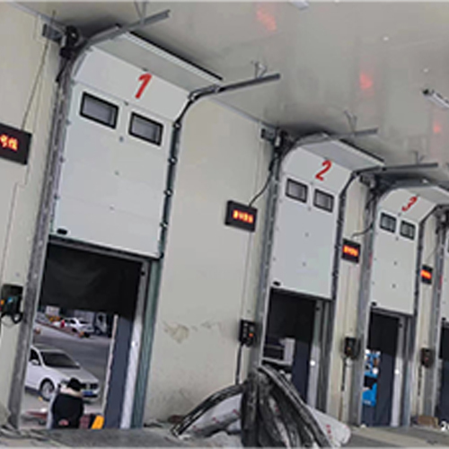 0.2-0.4m/s Speed Overhead Sectional Lifting Door Industrial Door With Dock Seal For Express Delivery Hubs