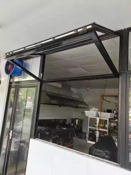Emergency Egress Folding Window System Meeting Building Codes While Maintaining Aesthetic Cohesion