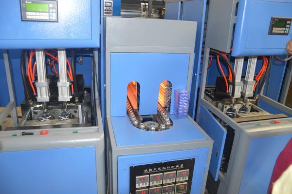 Máquina de moldagem por sopro manual de PET de 500 ml com volume e desempenho de peças ocas de 2000 ml