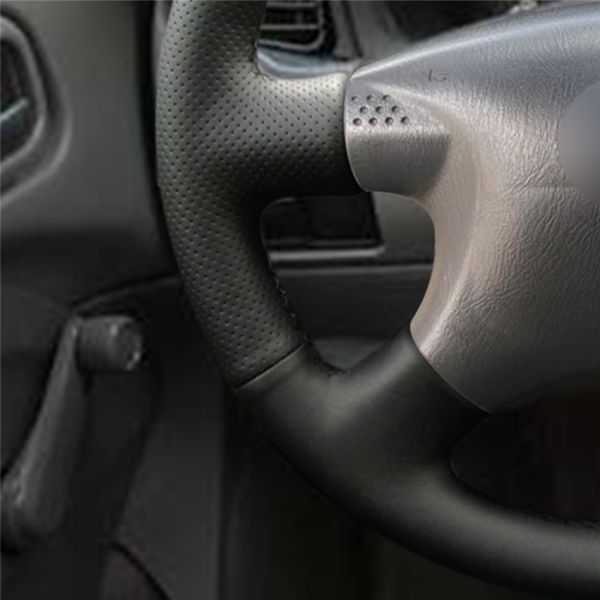 Add Style and Comfort to Your Nissan Sentra 2000-2006 with This Steering Wheel Cover