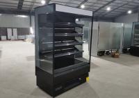 Supermercado que vende a mostra aberta do fruto do refrigerador da exposição