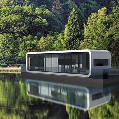 Um quarto Uma cozinha aberta Um salão Um banheiro Casa pré-fabricada de aço para hotel