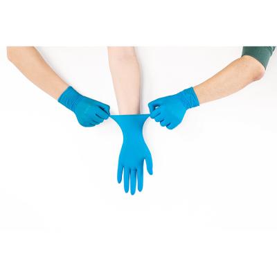 As luvas médicas livres do nitrilo do pó não estéril entregam Gants