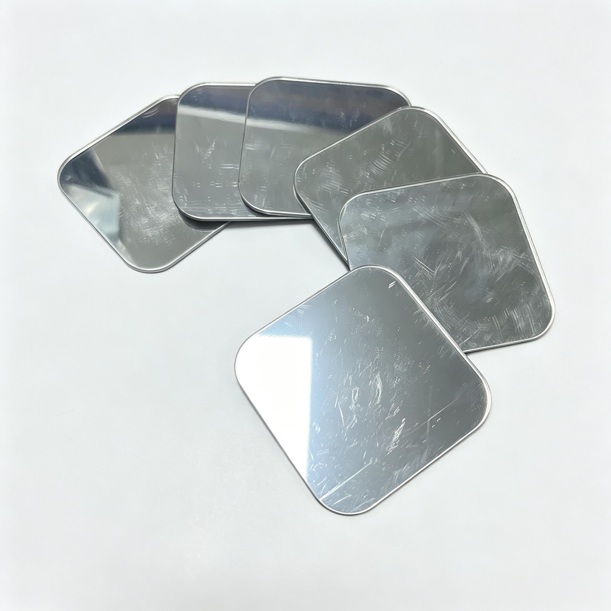 plexiglass mirror sheets cut to size with adhesive tape