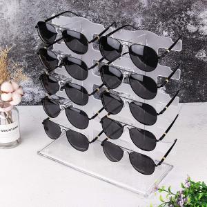 Les lunettes de soleil transparentes d'ODM des verres de présentoir étirent le