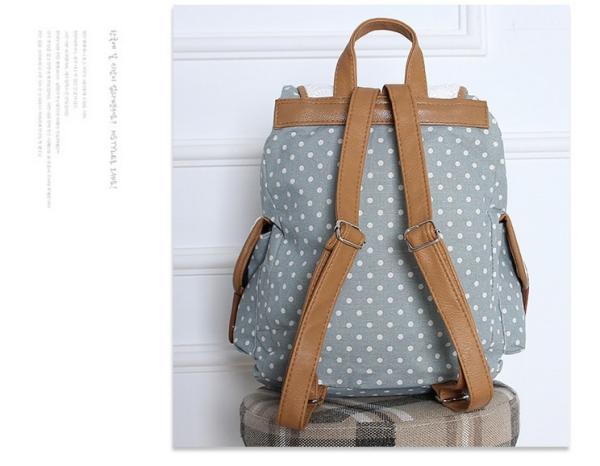 2016 new winter female European and American fashion jacquard material dot pattern lace embroidered backpack canvas bag