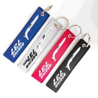 Logotipo promocional personalizado en blanco Anime lindo 3D de dos lados Tejido de tela bordado llave Jet Tag llavero