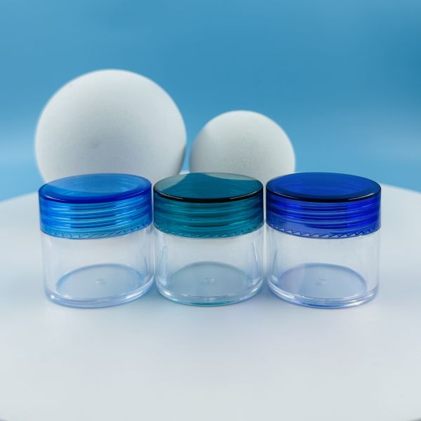 Garrafas de plástico altamente OEM transparente com tampas coloridas 30g garrafas cosméticas para cuidados faciais