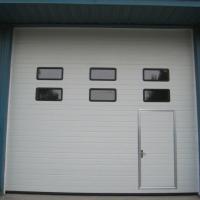 a doca de carregamento secional do armazém industrial da espuma de poliuretano de 40mm rola acima das portas