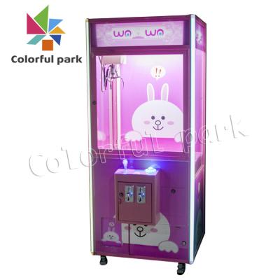 Os doces Toy Claw Grabber Machine Pink do pirulito moderaram o material de vidro