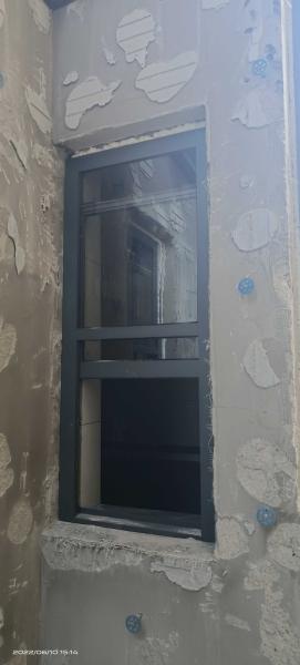 Companion Hearth Adjacent Folding Window Providing Supplemental Ventilation During Wood Burning Sessions