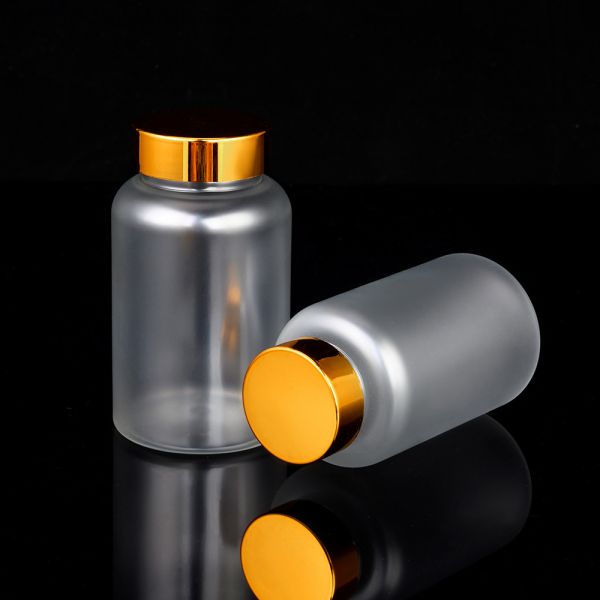 Highly Customized 4oz PET Capsule Bottle of Orange Black Plastic Nutrition Supplement with Purple Tamper Proof Packaging