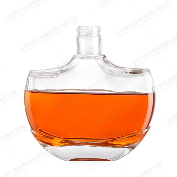 OEM/ODM Aceitação de garrafas de vidro transparentes de galvanização para brandy, uísque, vodka e licor