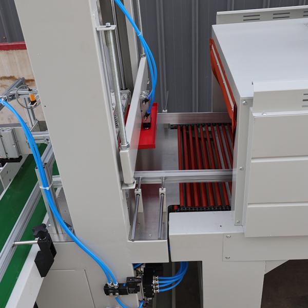 2KW Customizable Automatic Shrink Packaging Machine 0 - 15m/Min Conveying Speed