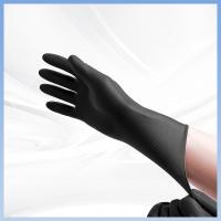 Saupoudrez les gants jetables libres d'examen de latex de laboratoire de gants de latex