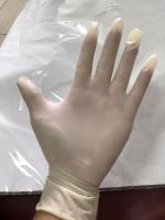 Gants chirurgicaux jetables 100pcs/box d'examen de latex