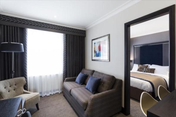 Singapore hospitality deluxe double studio room customized furniture Upholstered bed with Wardrobe closet and desk table