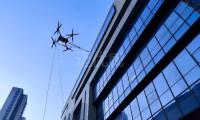DJI FlyCart 30 120m de haut Nettoyage de bâtiment Système de drone attaché