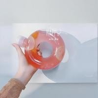 Bouteille de jus en plastique de forme personnalisée 550 ml PP en forme de donut Bouteille en plastique PETG pour thé au lait avec couvercle à anneau de traction
